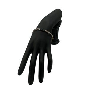 Elegant Gold-Plated Bangle Bracelet With Red Green and Blue Stones